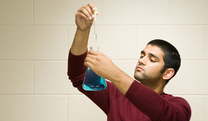 Student doing an experiment
