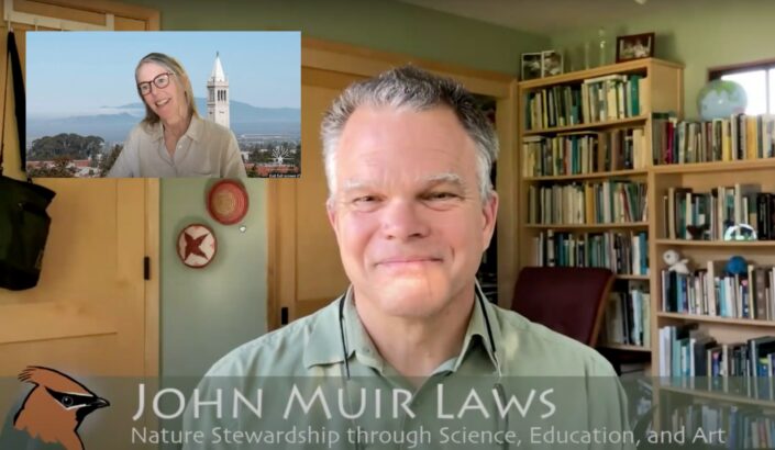 Image of man smiling and looking at camera on Zoom with woman in smaller screen smiling